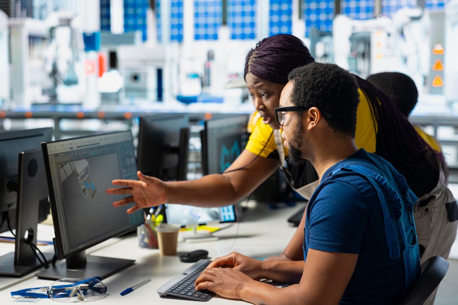 african-american-engineering-team-doing-quality-control-computer-setup_482257-125168